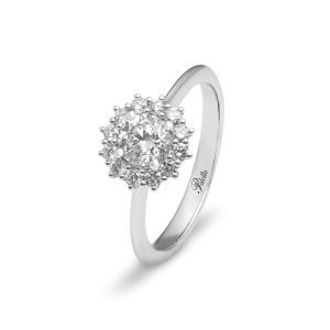 Anello a fiore in platino con diamanti taglio brillante.