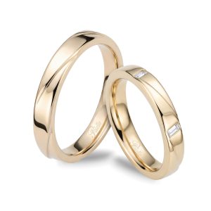 Fedi in oro champagne e diamanti taglio baguette