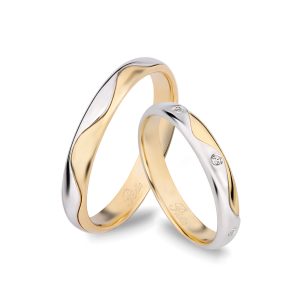 Fedi in oro bianco, giallo e diamanti