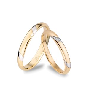 Fedi in oro bianco, giallo e diamanti